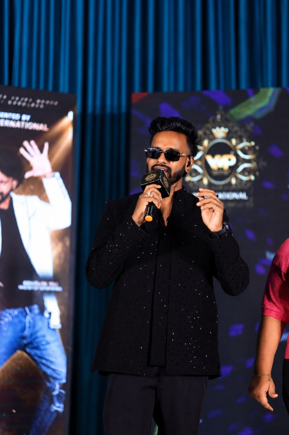 Hosting promotional event on stage with microphone