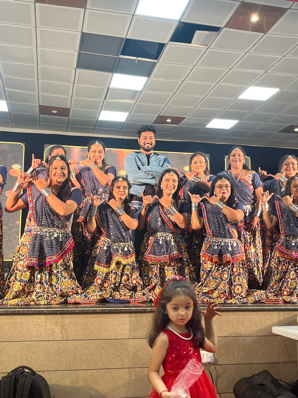 Stage performance group in matching costumes